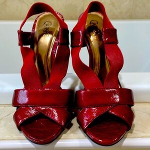 Red Carlos Santana 3 1/2” heels.